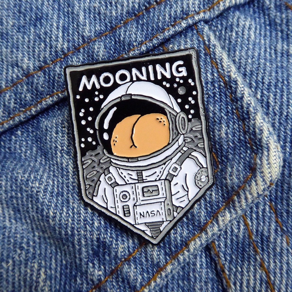 Mooning Asstronaut enamel pin
